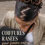 Femme noire avec une coiffure rasée élégante et moderne.
