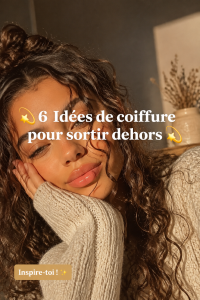 Femme avec une coiffure élégante prête pour une sortie.