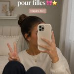 Une petite fille souriante avec une coiffure colorée pour enfants