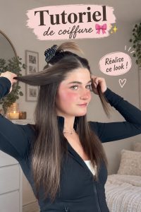 Femme avec une coiffure moderne et élégante réalisant un tutoriel de coiffure.